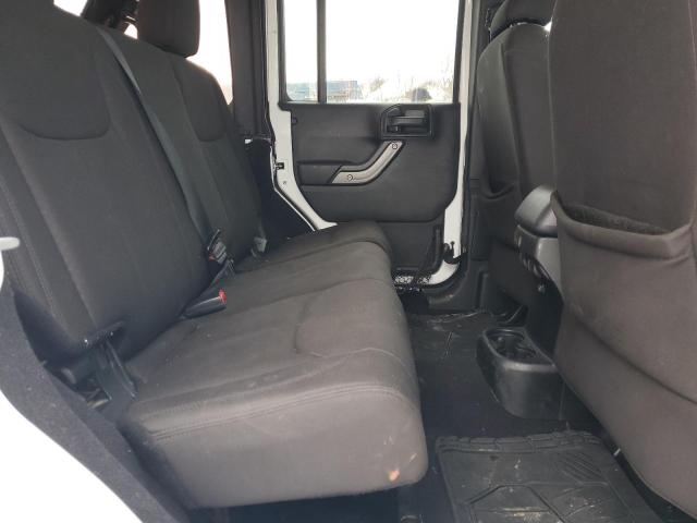 Photo 11 from auction – 2015 JEEP WRANGLER U with VIN 1C4BJWDG7FL689462