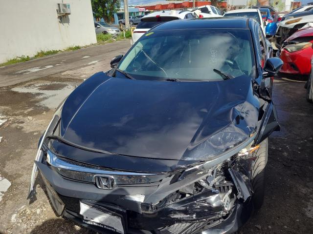 Photo 5 from auction – 2018 HONDA CIVIC LX with VIN 2HGFC2F50JH523923
