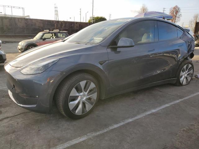 TESLA MODEL Y 2023 with VIN 7SAYGAEE2PF912152 - Photo from auction