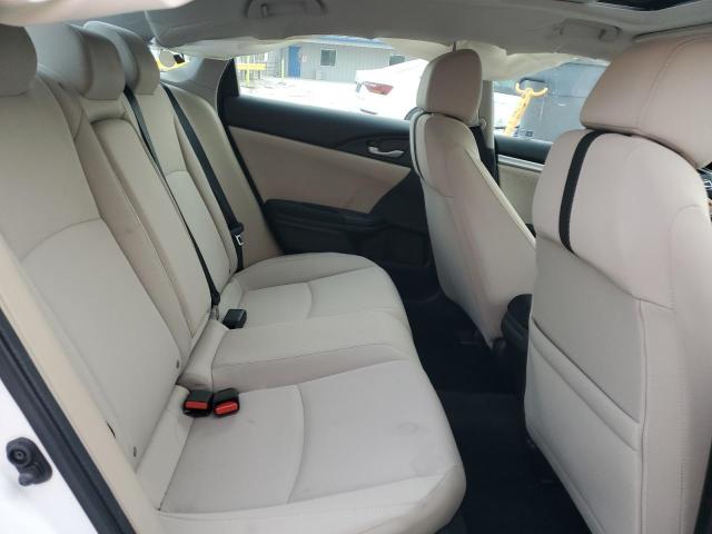 Photo 10 from auction – 2018 HONDA CIVIC EX with VIN 19XFC2F70JE010408