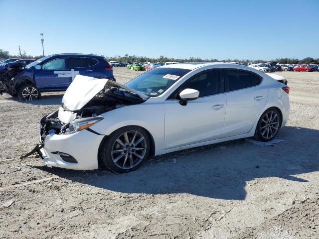 MAZDA 3 TOURING 2018 with VIN 3MZBN1V30JM271252 - Photo from auction