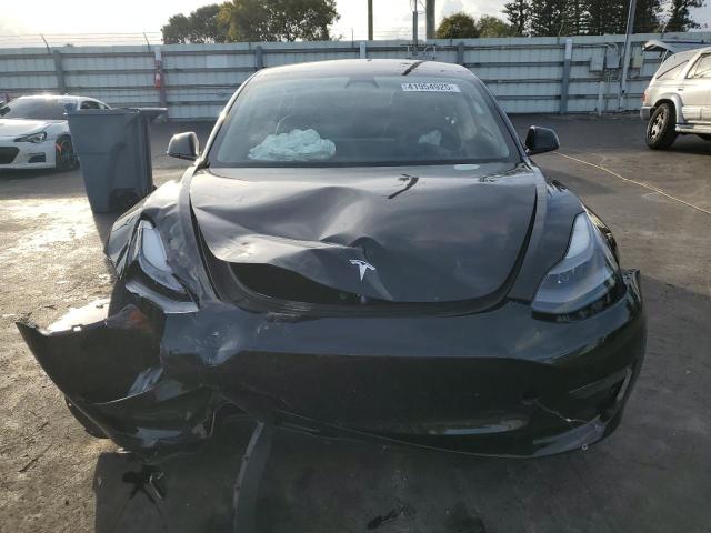 Photo 5 from auction – 2023 TESLA MODEL 3 with VIN 5YJ3E1EA1PF595569