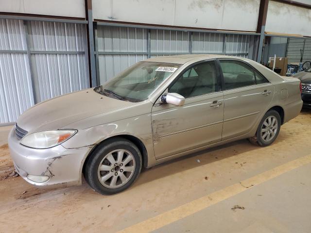 TOYOTA CAMRY LE 2004 with VIN JTDBF32K540154443 - Photo from auction
