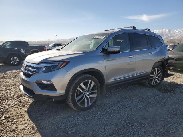 HONDA PILOT 2018 with VIN 5FNYF6H96JB051433 - Photo from auction