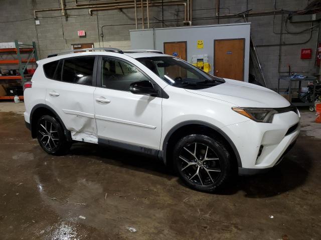 Photo 4 from auction – 2017 TOYOTA RAV4 SE with VIN JTMJFREV9HD221354