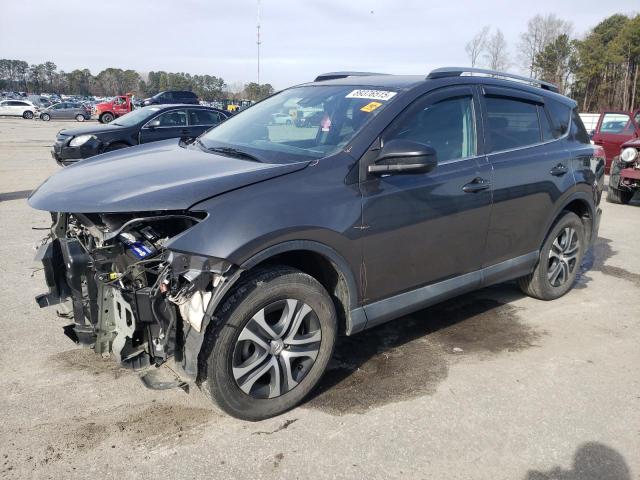 TOYOTA RAV4 LE 2018 with VIN 2T3ZFREV0JW454986 - Photo from auction