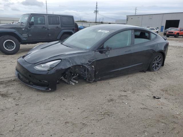 TESLA MODEL 3 2021 with VIN 5YJ3E1EBXMF049521 - Photo from auction