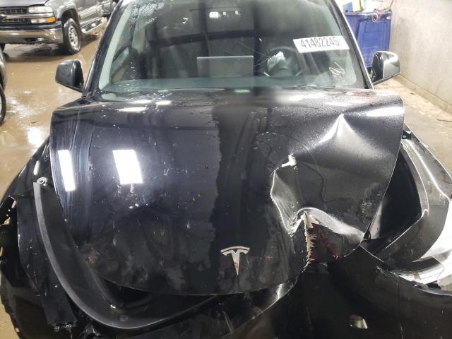 Photo 11 from auction – 2023 TESLA MODEL Y with VIN 7SAYGDEE1PF749365
