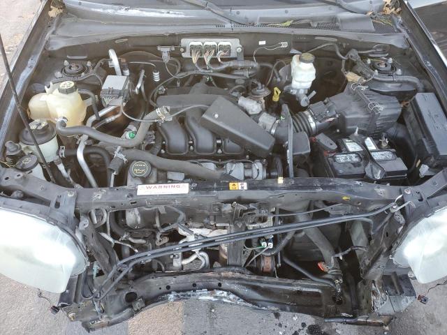 Photo 12 from auction – 2006 FORD ESCAPE LIM with VIN 1FMCU94176KC26988