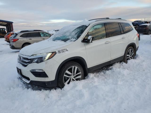 HONDA PILOT ELIT 2018 with VIN 5FNYF6H01JB052605 - Photo from auction