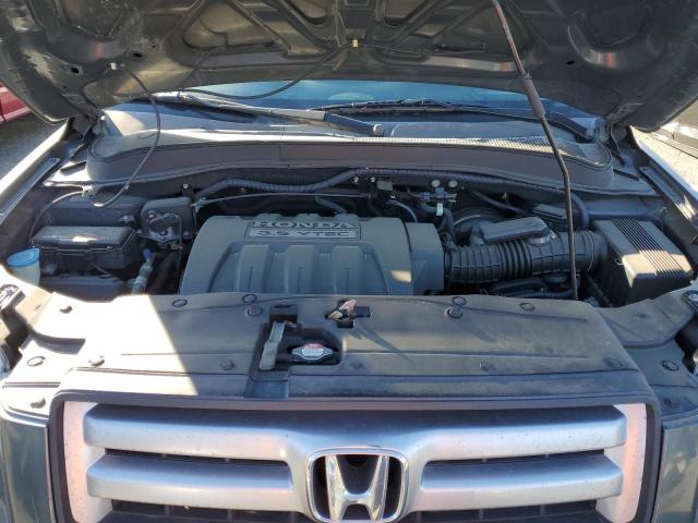 Photo 12 from auction – 2006 HONDA PILOT EX with VIN 2HKYF18526H543241