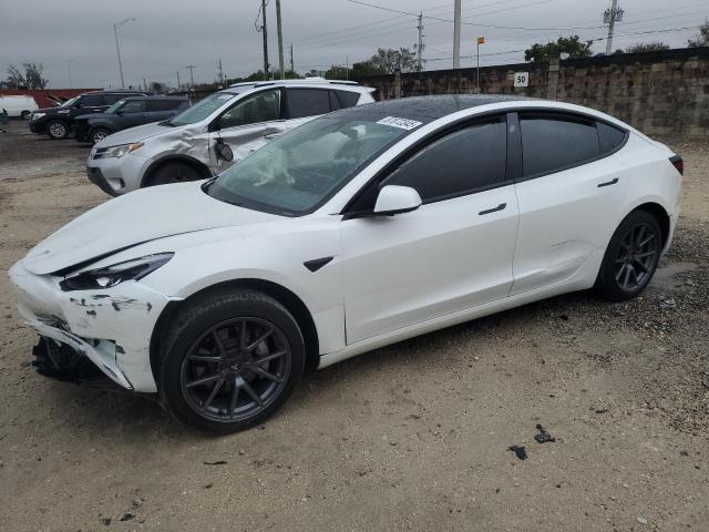 TESLA MODEL 3 2023 with VIN 5YJ3E1EA6PF573051 - Photo from auction