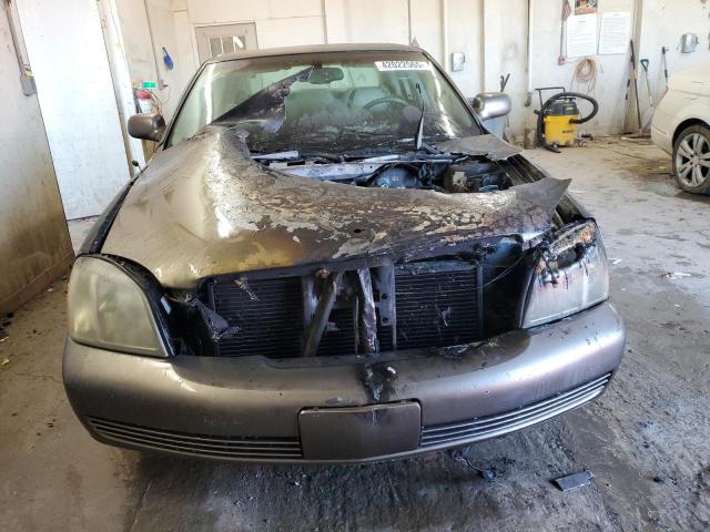 Photo 5 from auction – 2003 CADILLAC DEVILLE with VIN 1G6KD54Y33U154969