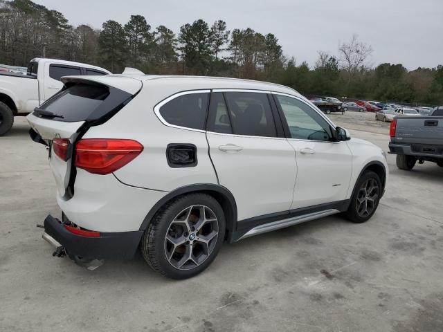 Photo 3 from auction – 2016 BMW X1 XDRIVE2 with VIN WBXHT3C31G5E50647