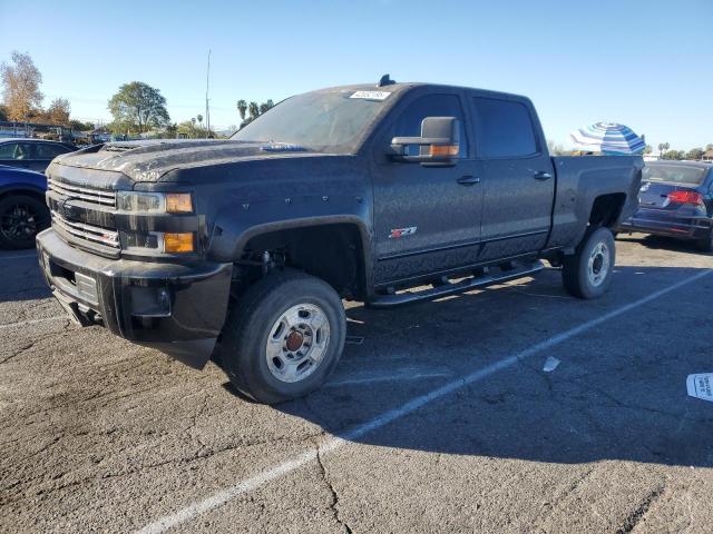 CHEVROLET SILVERADO 2018 with VIN 1GC1KWEY1JF119805 - Photo from auction