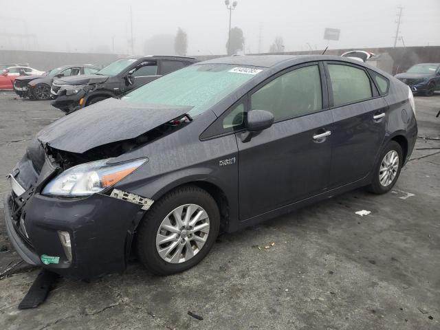 TOYOTA PRIUS PLUG 2015 with VIN JTDKN3DP8F3073918 - Photo from auction