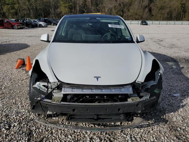 Photo 5 from auction – 2022 TESLA MODEL Y with VIN 7SAYGAEE1NF537013