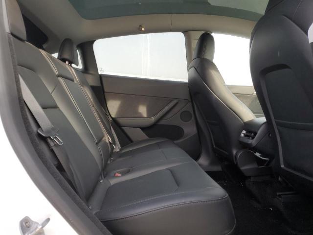 Photo 11 from auction – 2023 TESLA MODEL Y with VIN 7SAYGDEE5PA125887