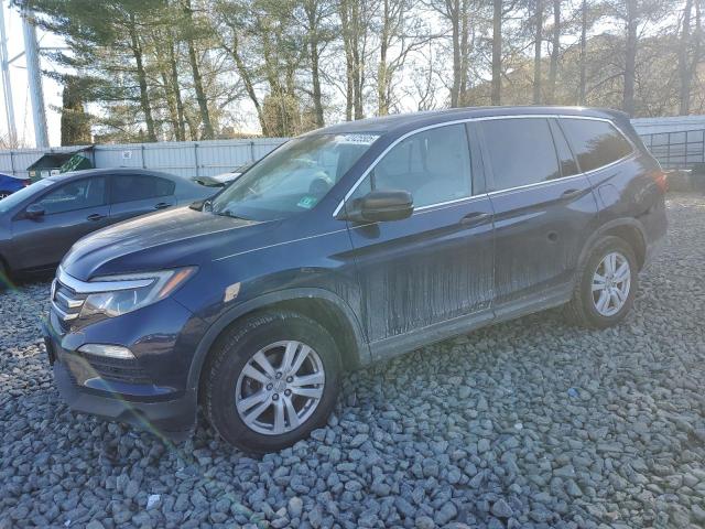 HONDA PILOT LX 2018 with VIN 5FNYF6H13JB040089 - Photo from auction
