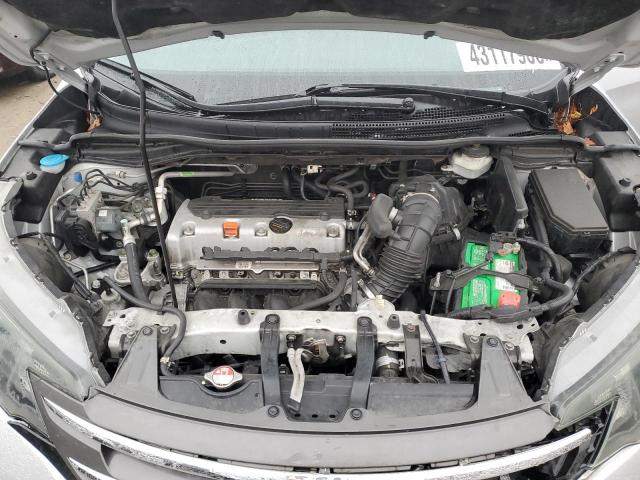 Photo 12 from auction – 2014 HONDA CR-V LX with VIN 2HKRM3H33EH563243