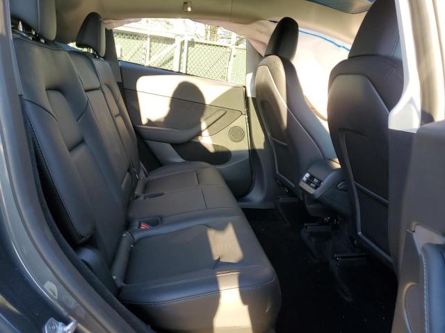 Photo 11 from auction – 2023 TESLA MODEL Y with VIN 7SAYGDEE6PF831687