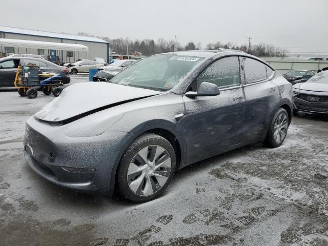 TESLA MODEL Y 2023 with VIN 7SAYGAEE4PF597693 - Photo from auction