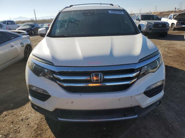 Photo 5 from auction – 2016 HONDA PILOT ELIT with VIN 5FNYF6H02GB021078