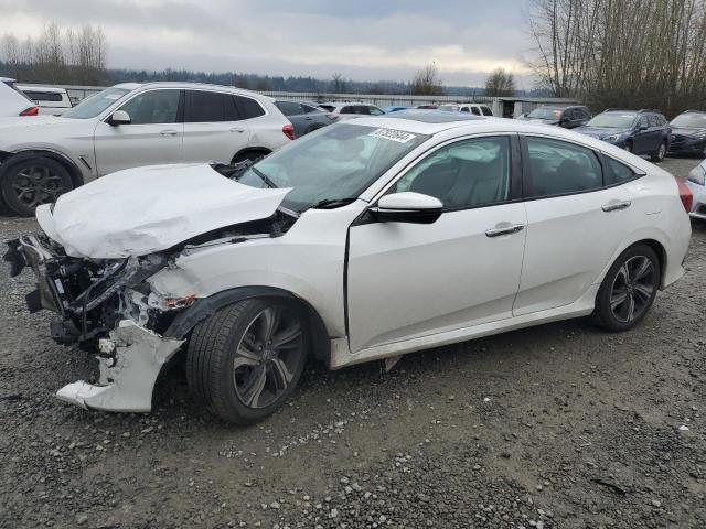 HONDA CIVIC TOUR 2016 with VIN 19XFC1F94GE213872 - Photo from auction