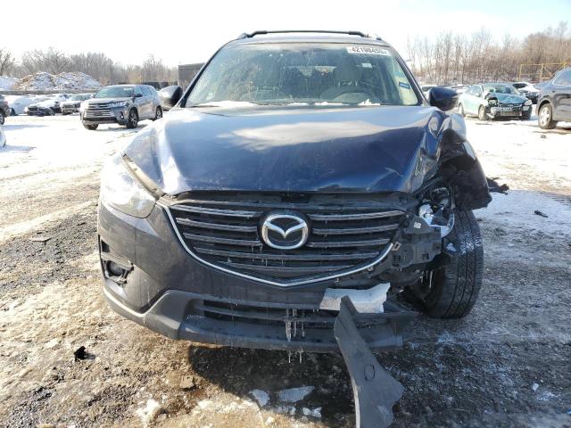 Photo 5 from auction – 2016 MAZDA CX-5 TOURI with VIN JM3KE4CYXG0876109