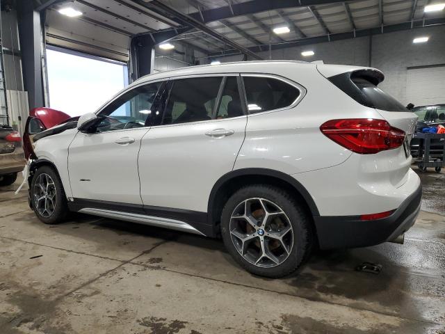 Photo 2 from auction – 2018 BMW X1 XDRIVE2 with VIN WBXHT3C30J5K28783