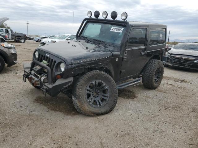 JEEP WRANGLER S 2011 with VIN 1J4AA2D15BL596332 - Photo from auction