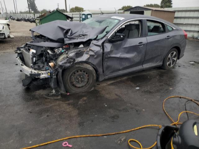 HONDA CIVIC LX 2019 with VIN 19XFC2F67KE045908 - Photo from auction