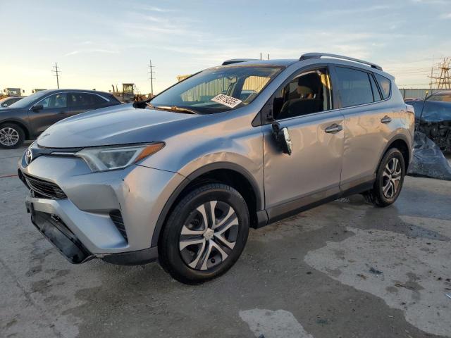 TOYOTA RAV4 LE 2016 with VIN 2T3ZFREV5GW298209 - Photo from auction