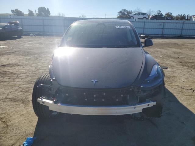 Photo 5 from auction – 2023 TESLA MODEL Y with VIN 7SAYGDED6PF979667