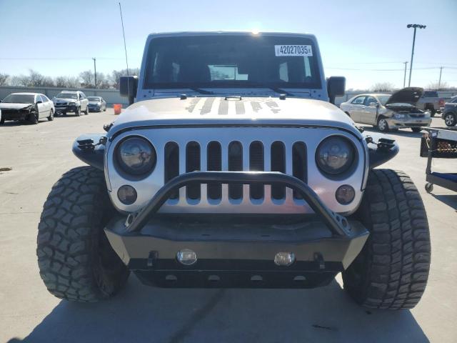 Photo 5 from auction – 2014 JEEP WRANGLER U with VIN 1C4BJWDG0EL178660