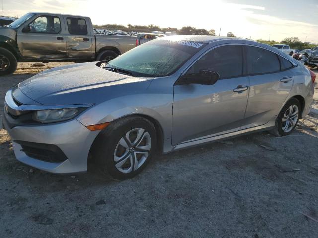 HONDA CIVIC LX 2018 with VIN 19XFC2F57JE031884 - Photo from auction