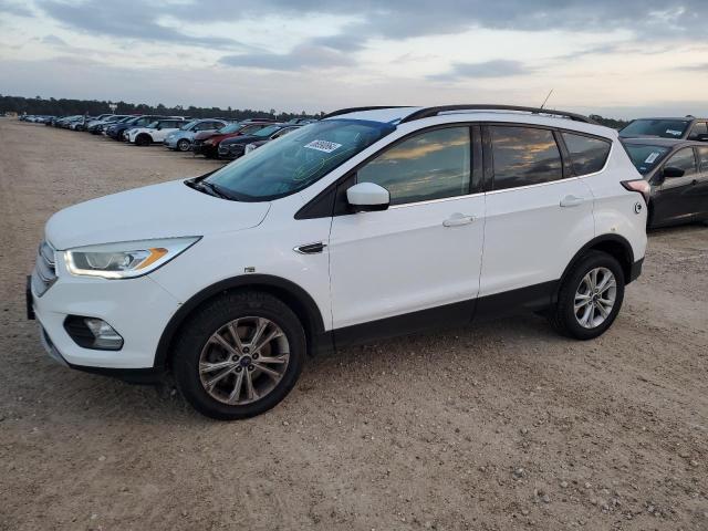 FORD ESCAPE 2018 with VIN 1FMCU9HD0JUD23600 - Photo from auction
