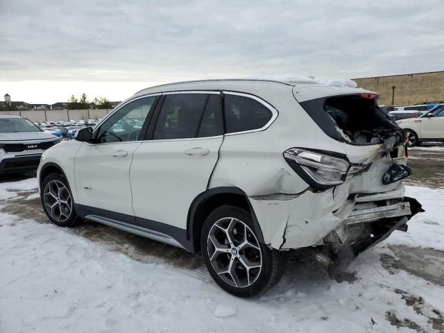 Photo 2 from auction – 2018 BMW X1 XDRIVE2 with VIN WBXHT3C31J5K32275