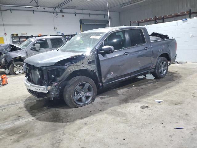 HONDA RIDGELINE 2023 with VIN 5FPYK3F5XPB067628 - Photo from auction