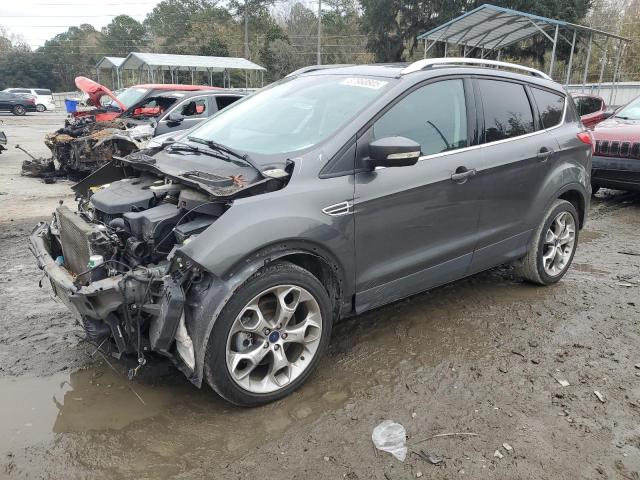FORD ESCAPE TIT 2016 with VIN 1FMCU0J98GUC85799 - Photo from auction