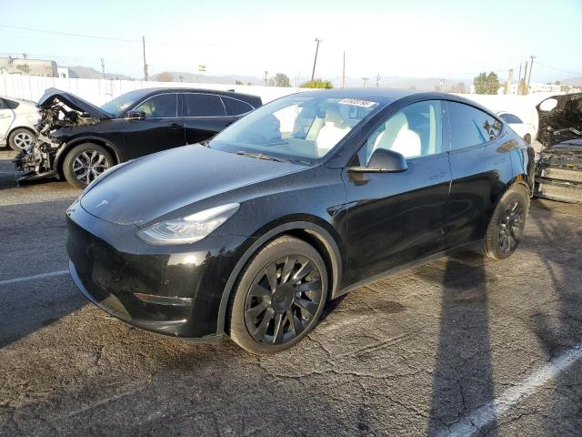 TESLA MODEL Y 2021 with VIN 5YJYGDEE6MF222575 - Photo from auction