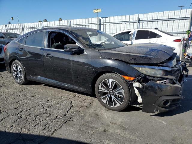 Photo 4 from auction – 2016 HONDA CIVIC EX with VIN 2HGFC1F32GH634023