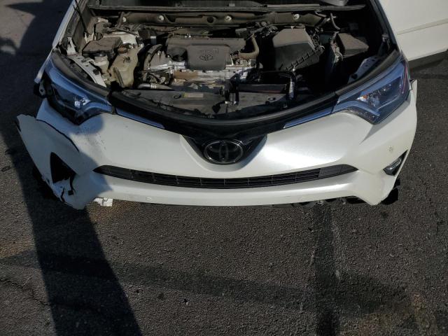 Photo 12 from auction – 2016 TOYOTA RAV4 LIMIT with VIN 2T3YFREV9GW309627