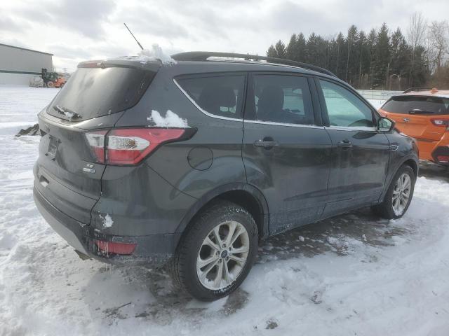 Photo 3 from auction – 2017 FORD ESCAPE SE with VIN 1FMCU9GD7HUC17060