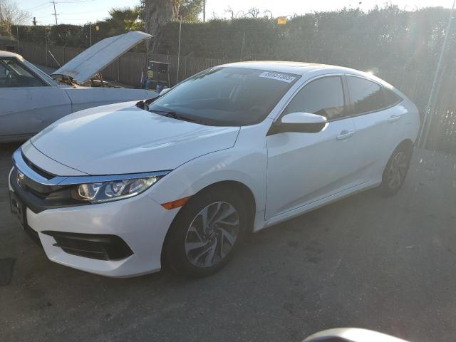 HONDA CIVIC EX 2018 with VIN 2HGFC2F73JH546534 - Photo from auction