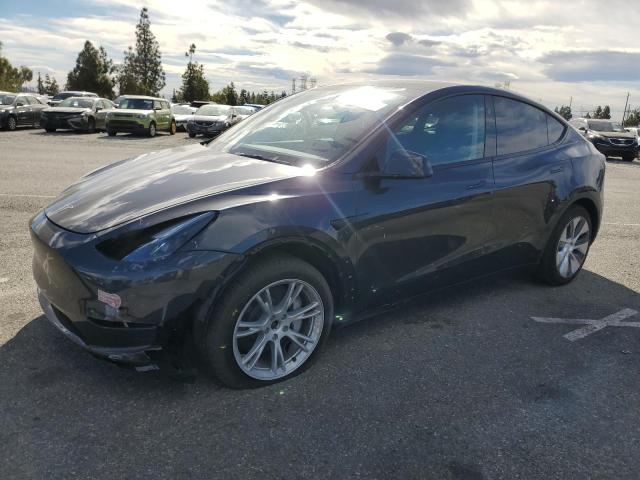 TESLA MODEL Y 2024 with VIN 7SAYGDEE7RF077198 - Photo from auction
