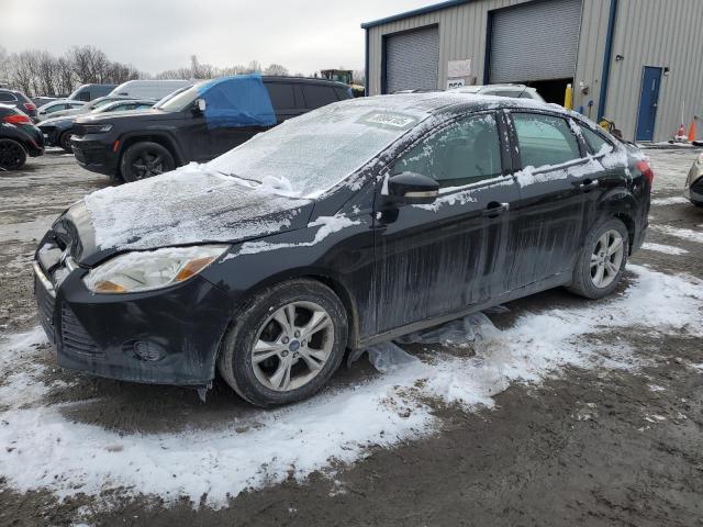 FORD FOCUS SE 2014 with VIN 1FADP3F21EL150640 - Photo from auction