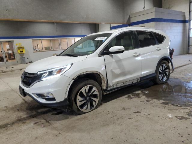HONDA CR-V TOURI 2016 with VIN 5J6RM4H92GL080930 - Photo from auction