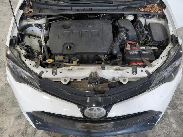 Photo 11 from auction – 2017 TOYOTA COROLLA L with VIN 5YFBURHE5HP569154