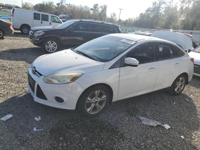 FORD FOCUS SE 2014 with VIN 1FADP3F28EL147511 - Photo from auction